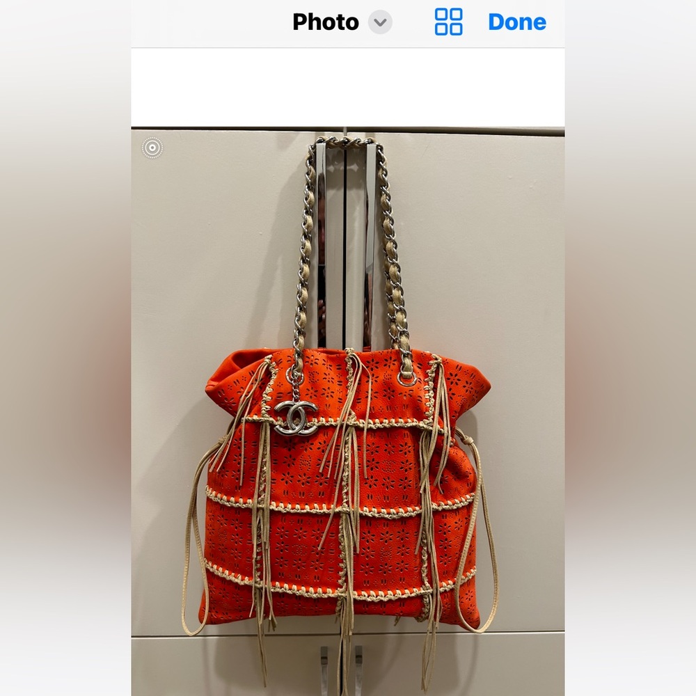 Orange Chanel lamb skin handbag with fringe silver hardware,
